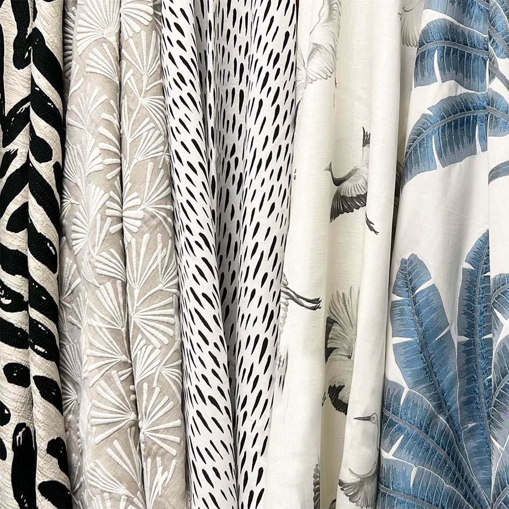 Curated selection of JF Studio Luxury home textiles showcasing various textures and patterns. Primoends. Home Decor to Go