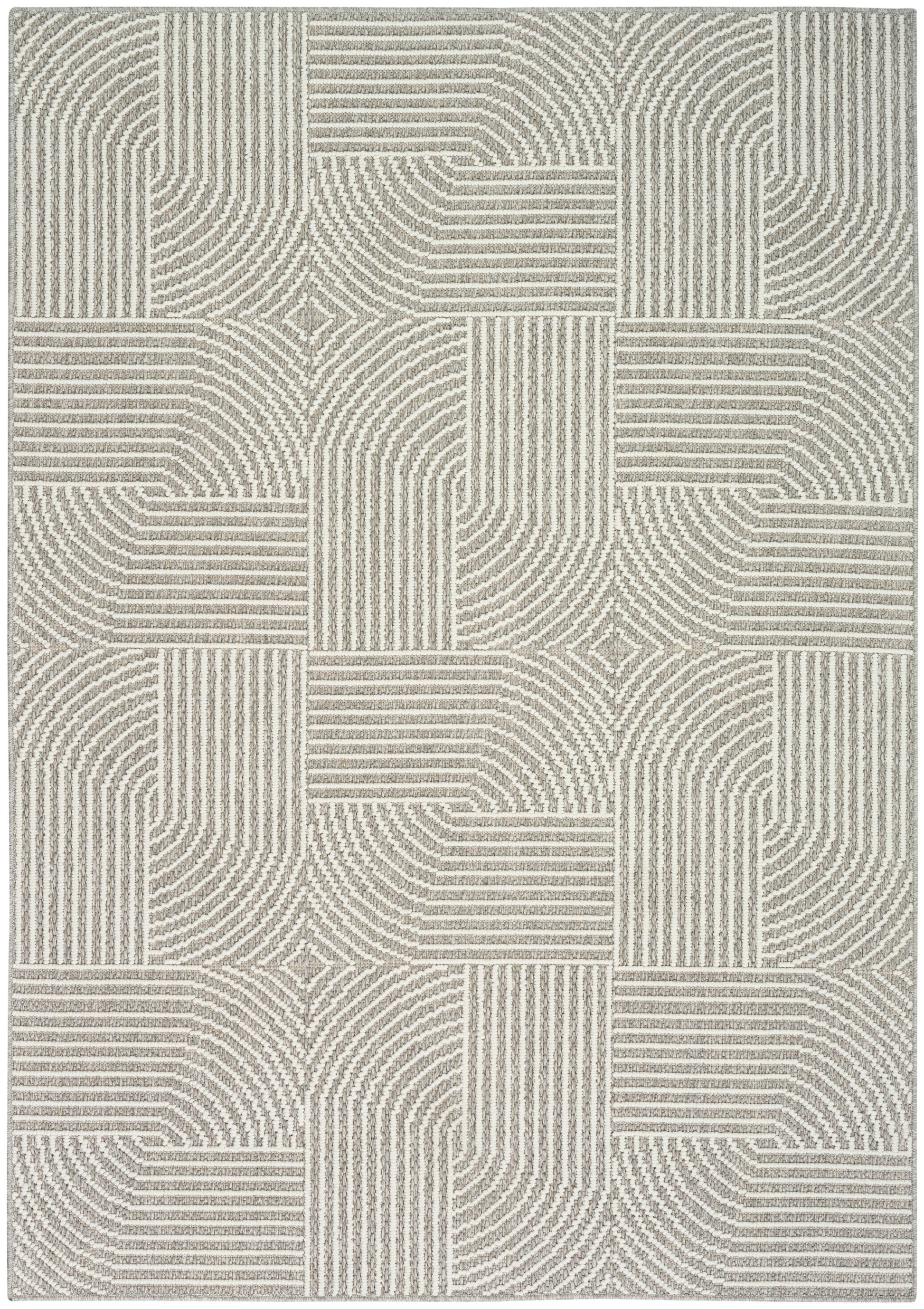 Beige and gray geometric rug with patchwork squares of concentric lines; modern home decor.
