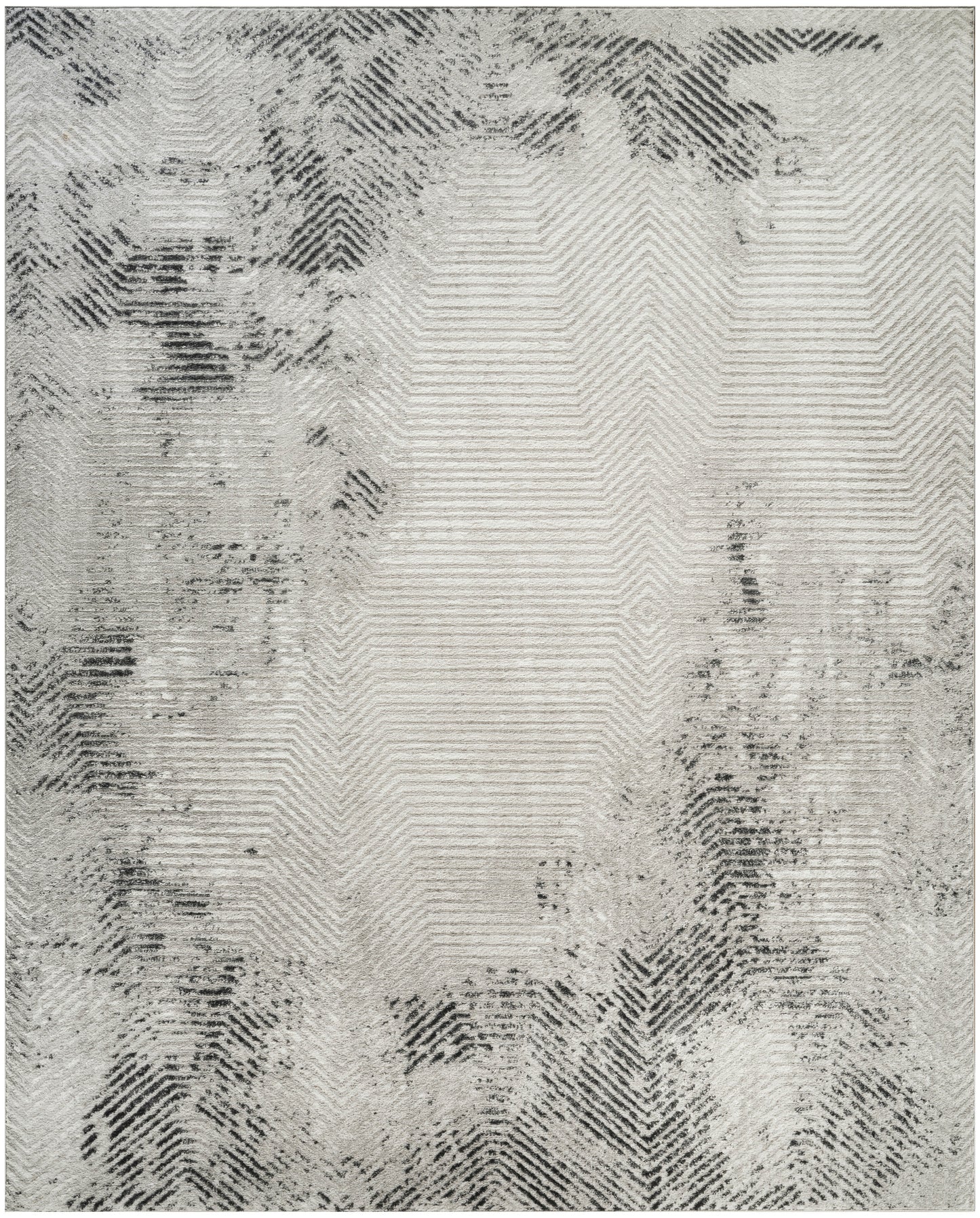 Gray and ivory area rug with a subtle chevron/herringbone pattern and irregular dark edges.