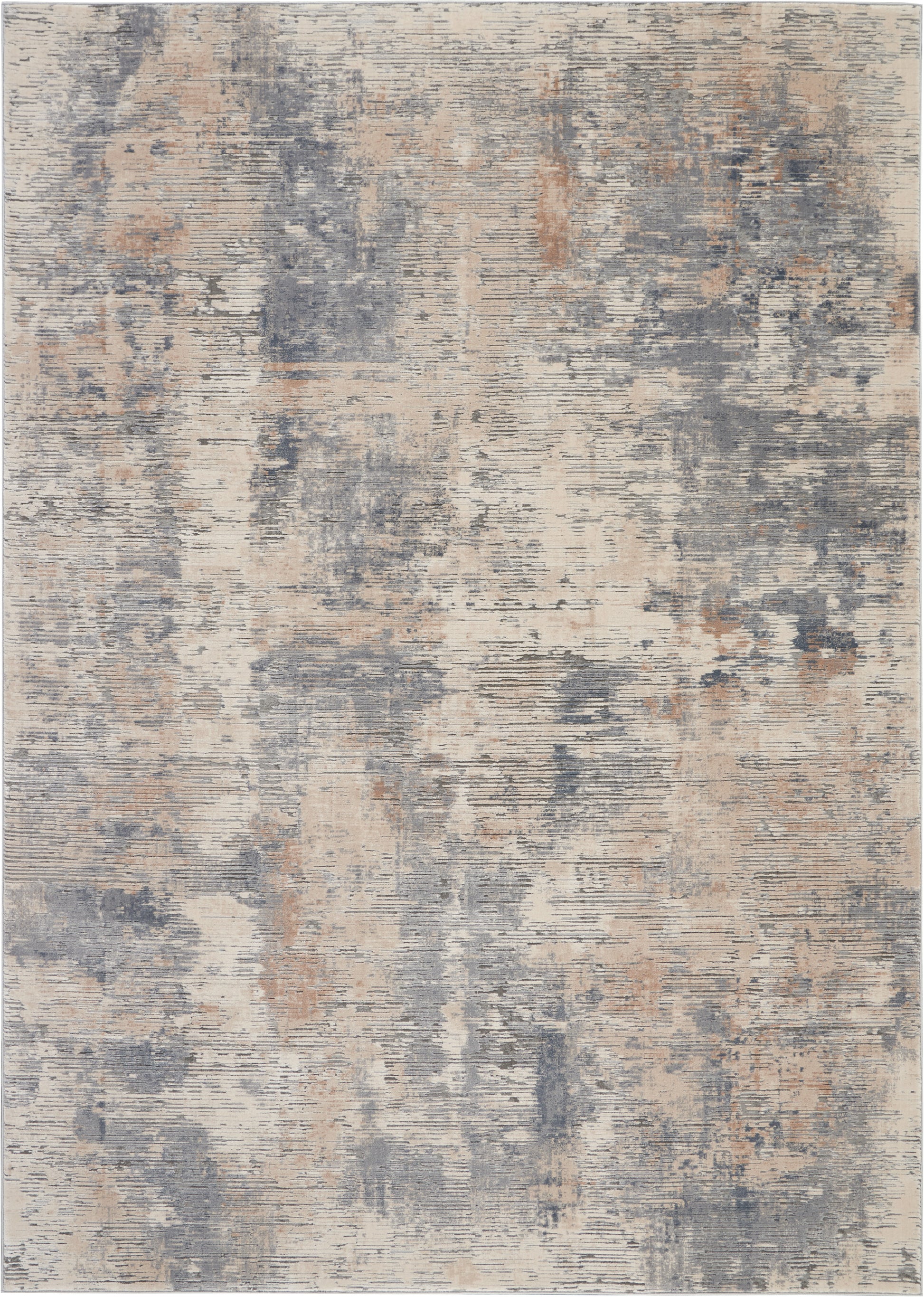 Rectangular abstract distressed rug in beige, blue-gray and rust accents; modern vintage-inspired decor.
