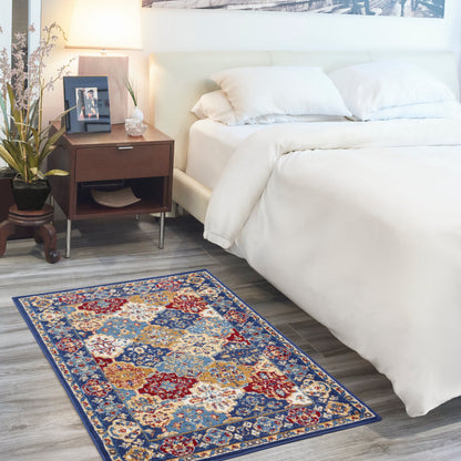 Blue-border multicolor Bohemian area rug, 3' x 5'.