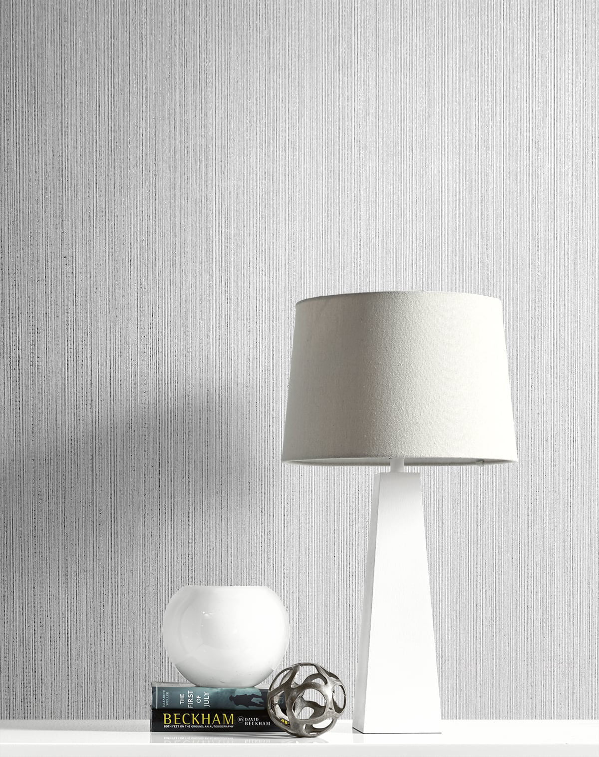 Natural Stria gray mist textured wallpaper by Etten Studios, vertical stria pattern with soft metallic shimmer, luxury neutral wallcovering for modern, minimalist, and contemporary interiors.