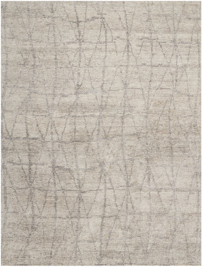 Light taupe-gray area rug with an allover abstract geometric lattice in muted, soft lines.