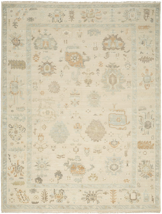 Rectangular cream Oriental rug with pale blue border and faded pastel floral motifs; vintage traditional style.