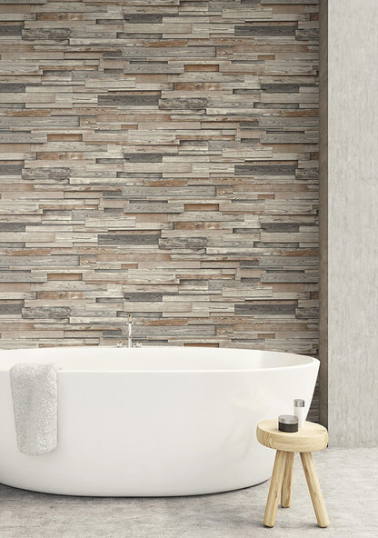 NextWall Reclaimed Wood Plank peel and stick wallpaper in charcoal and brown with realistic weathered wood boards. Removable, washable wallpaper for farmhouse, rustic, industrial, and modern accent walls in living rooms, bedrooms, offices, and entryways.