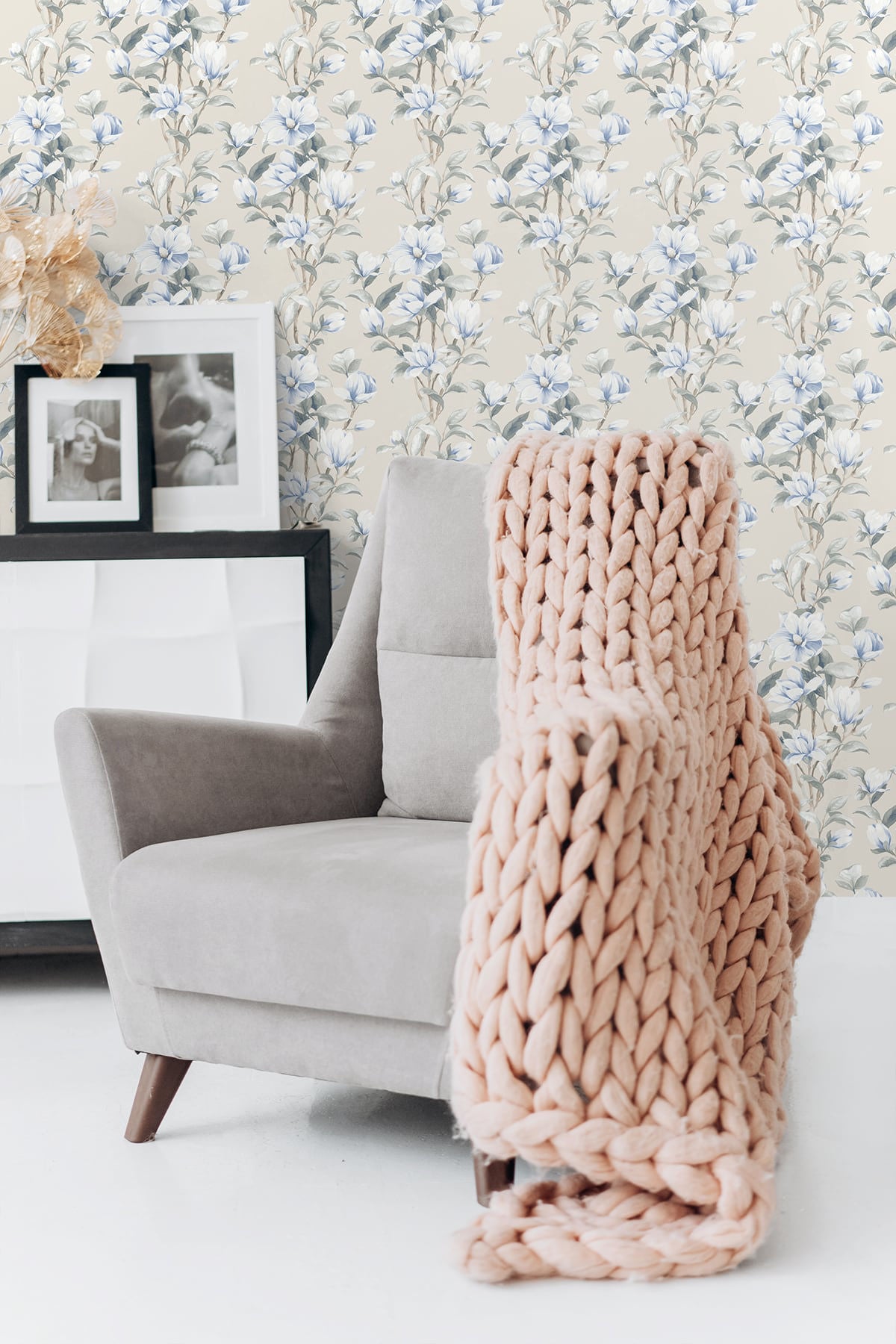 Blue and white magnolia floral wallpaper featuring blooming magnolia flowers, delicate trailing branches, and a timeless botanical pattern. Magnolia Trail Peel and Stick Wallpaper in Linen and French Blue creates a serene accent wall for bedrooms, living rooms, dining rooms, home offices, and traditional or coastal-inspired interiors. Easy-to-install removable wallpaper with elegant floral styling.