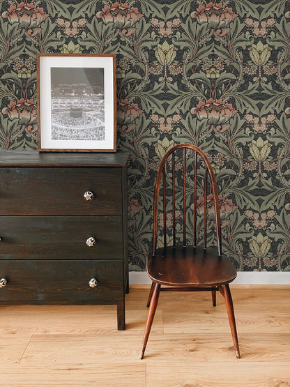 Acanthus Floral peel-and-stick wallpaper with a deep charcoal black background and rich rosewood botanical florals and leaves. The intricate vintage-inspired pattern creates a dramatic, elegant accent wall for bedrooms, powder rooms, dining rooms, living rooms, entryways and home offices. A sophisticated floral wallpaper for traditional, transitional, vintage and modern interiors.