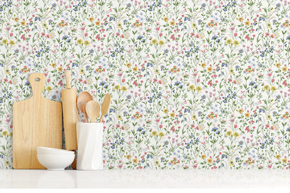 Wildflowers Peel and Stick Wallpaper in Multicolored featuring vibrant floral blooms and botanical patterns in soft colorful tones. Removable botanical wallpaper ideal for accent walls, bedrooms, nurseries, living rooms, apartments, offices, cottagecore interiors, boho décor, farmhouse homes, and DIY home decorating projects. Washable peel and stick wallcovering with colorful wildflower design for modern and vintage-inspired interiors.