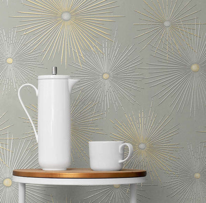 Modern Starburst Geo peel and stick wallpaper in silver smoke gray and metallic gold featuring a bold geometric starburst pattern. Removable wallpaper perfect for glam interiors, art deco décor, contemporary living rooms, bedrooms, offices, and luxury accent walls.