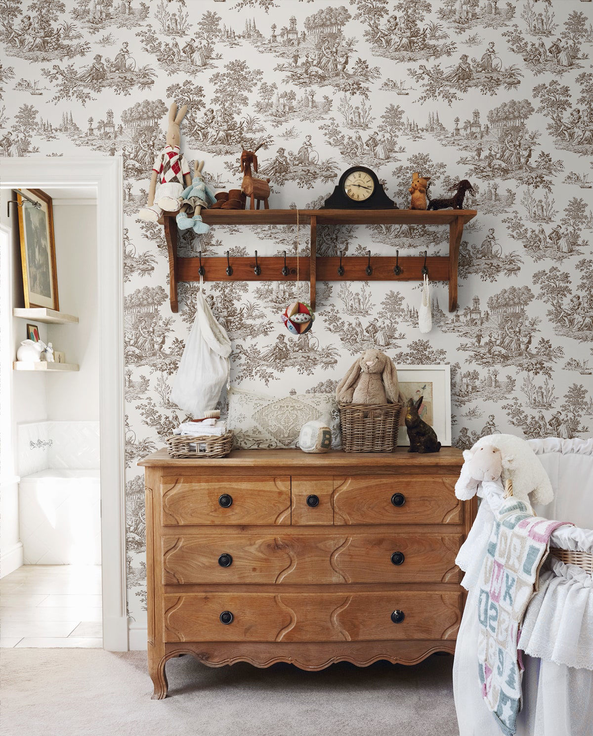 Chateau Toile Peel and Stick Wallpaper in Sable Brown featuring classic French toile scenic patterns in warm brown and taupe tones. Removable vintage-inspired wallpaper ideal for accent walls, dining rooms, bedrooms, powder rooms, entryways, apartments, French country homes, cottagecore interiors, traditional décor, and grandmillennial style spaces. Washable peel and stick wallcovering perfect for elegant DIY home decorating and timeless interior design.