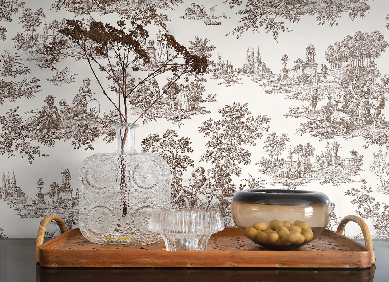 Chateau Toile Peel and Stick Wallpaper in Sable Brown featuring classic French toile scenic patterns in warm brown and taupe tones. Removable vintage-inspired wallpaper ideal for accent walls, dining rooms, bedrooms, powder rooms, entryways, apartments, French country homes, cottagecore interiors, traditional décor, and grandmillennial style spaces. Washable peel and stick wallcovering perfect for elegant DIY home decorating and timeless interior design.