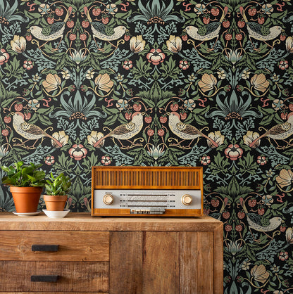 Black floral peel and stick wallpaper with bird and botanical pattern, Aves Garden Ebony design, removable wallpaper for renters, dark botanical wall decor for modern interiors, elegant accent wall idea for bedroom or living room, washable and easy to install wallpaper