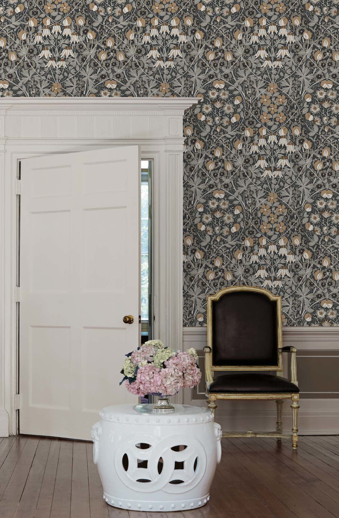 Tulip Garden peel and stick wallpaper by NextWall in muted gray tones featuring soft floral botanical design, removable and washable, ideal for accent walls, rentals, and modern interior styling.