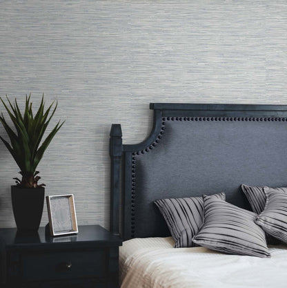 Cyrus Faux Grasscloth peel and stick wallpaper in Dove Grey and Bluestone featuring a realistic woven grasscloth texture. Blue-gray removable wallpaper ideal for coastal, contemporary, modern, farmhouse, and transitional interiors, including bedrooms, living rooms, home offices, dining rooms, and elegant accent walls.
