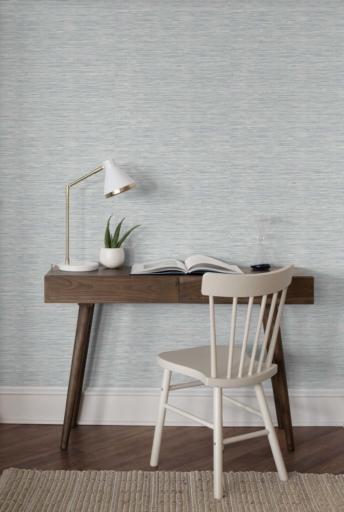 Cyrus Faux Grasscloth peel and stick wallpaper in Dove Grey and Bluestone featuring a realistic woven grasscloth texture. Blue-gray removable wallpaper ideal for coastal, contemporary, modern, farmhouse, and transitional interiors, including bedrooms, living rooms, home offices, dining rooms, and elegant accent walls.