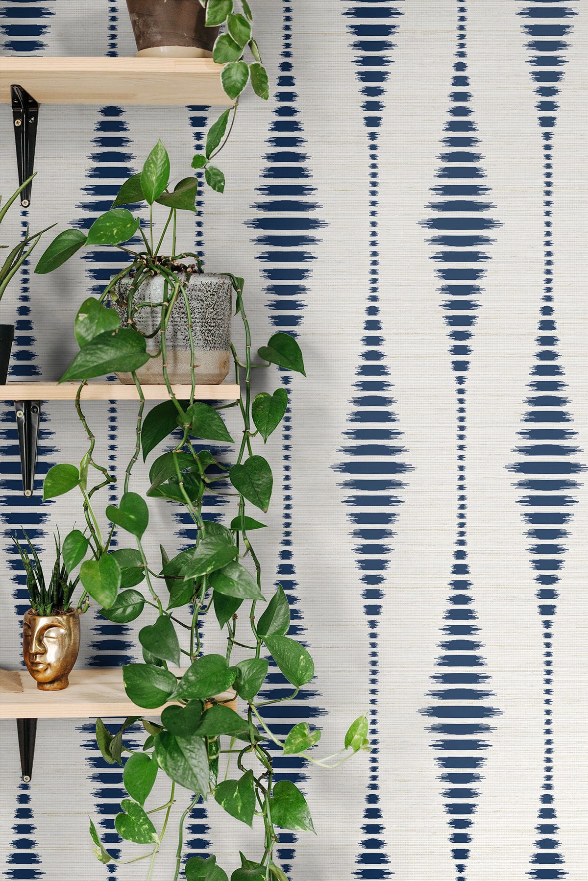 Striped Ikat Peel and Stick Wallpaper in Navy Blue and Linen featuring a classic geometric ikat stripe pattern. Removable wallpaper with elegant navy tones ideal for accent walls, living rooms, bedrooms, home offices, coastal interiors, modern spaces, and renter-friendly home decorating.