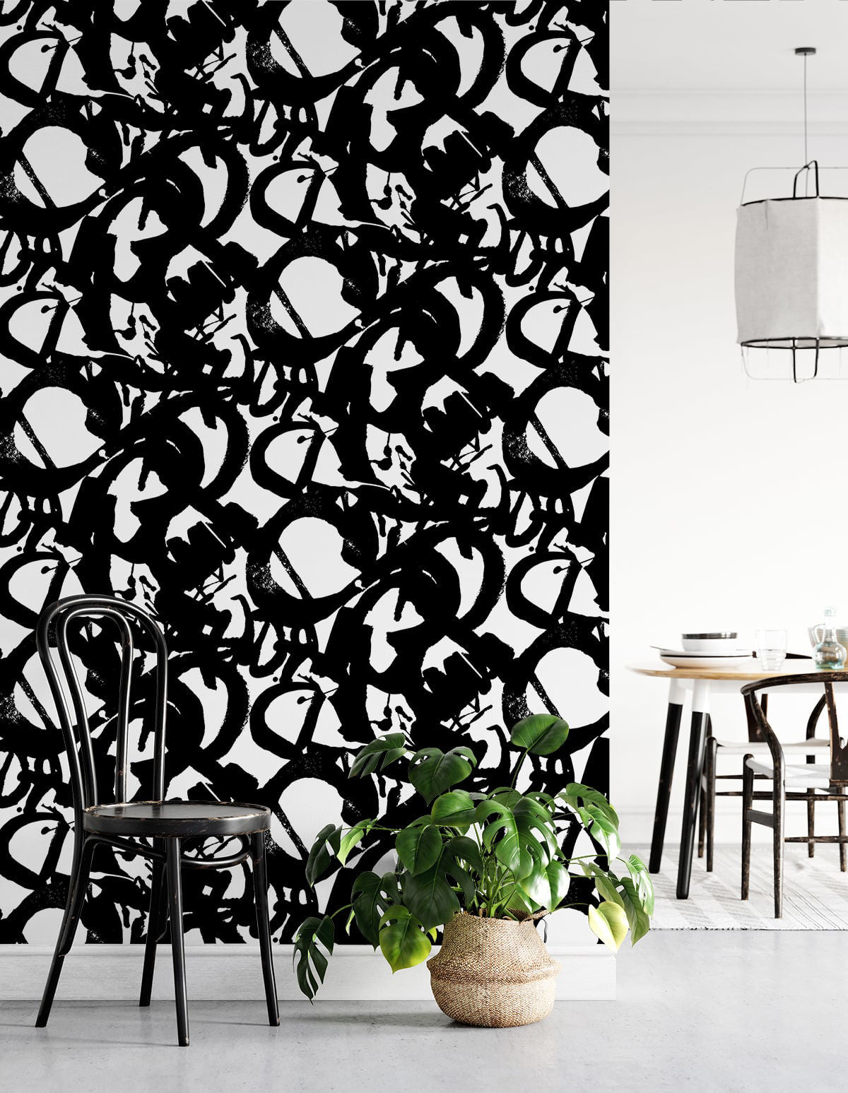 Bold black and white abstract wallpaper with dramatic ink brushstrokes on a white background. This Onyx peel-and-stick wallpaper adds artistic character to living rooms, bedrooms, home offices, powder rooms, entryways and modern accent walls.