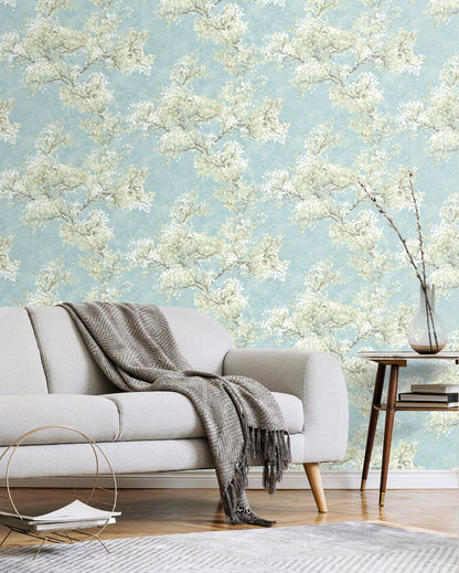 Cherry Blossom Grove Peel and Stick Wallpaper in Blue Mist and Green Tea featuring delicate blooming cherry blossoms, leafy branches, and soft botanical details. This elegant floral wallpaper showcases calming blue and green tones, creating a nature-inspired accent wall for bedrooms, living rooms, nurseries, dining rooms, and home offices. Removable, washable, and renter-friendly wallpaper with a sophisticated botanical design.