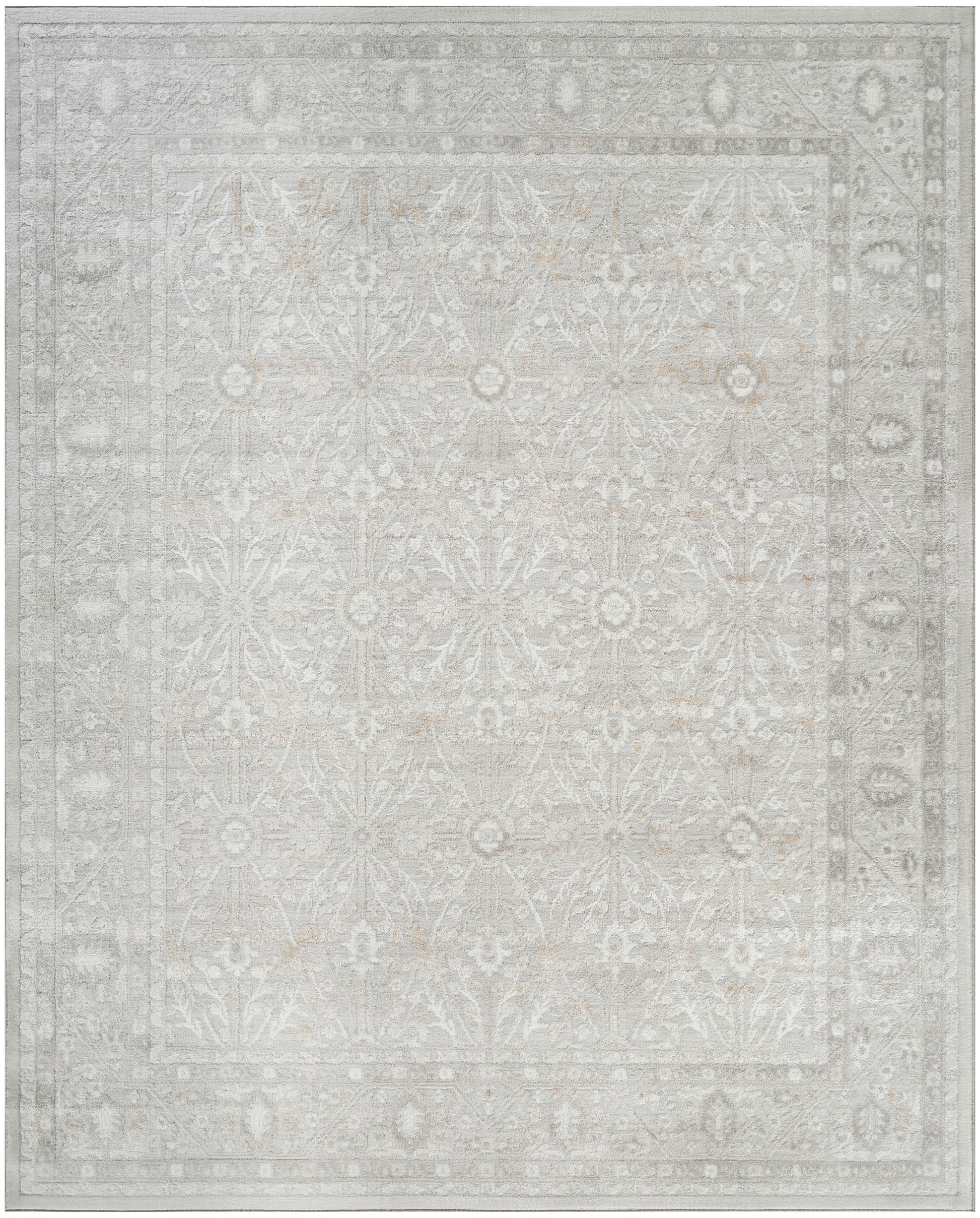 Rectangular light-gray oriental rug with pale ivory damask motifs and a decorative border; vintage distressed style.