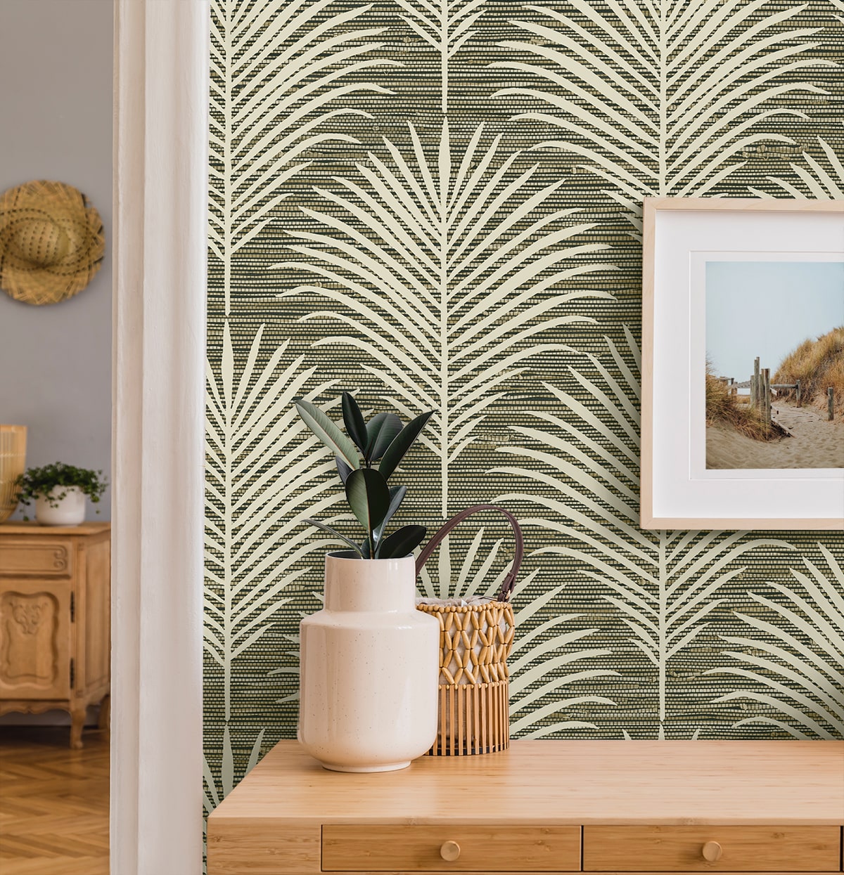 Grassland Palm peel and stick wallpaper with a soft tropical botanical pattern featuring layered palm leaves in charcoal and sand neutral tones. Removable self-adhesive wallpaper designed for accent walls in bedrooms, living rooms, dining rooms, bathrooms, offices, and entryways. Washable, renter-friendly wall covering that brings a warm, nature-inspired, coastal and boho aesthetic to modern interiors and easy DIY home décor updates.