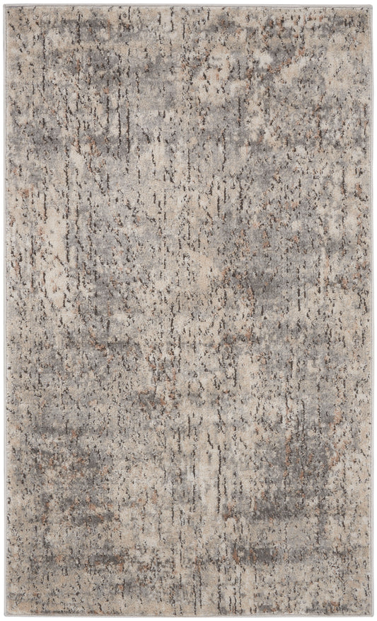 Rectangular area rug with abstract distressed pattern in beige, gray and taupe; modern, versatile decor for living spaces.