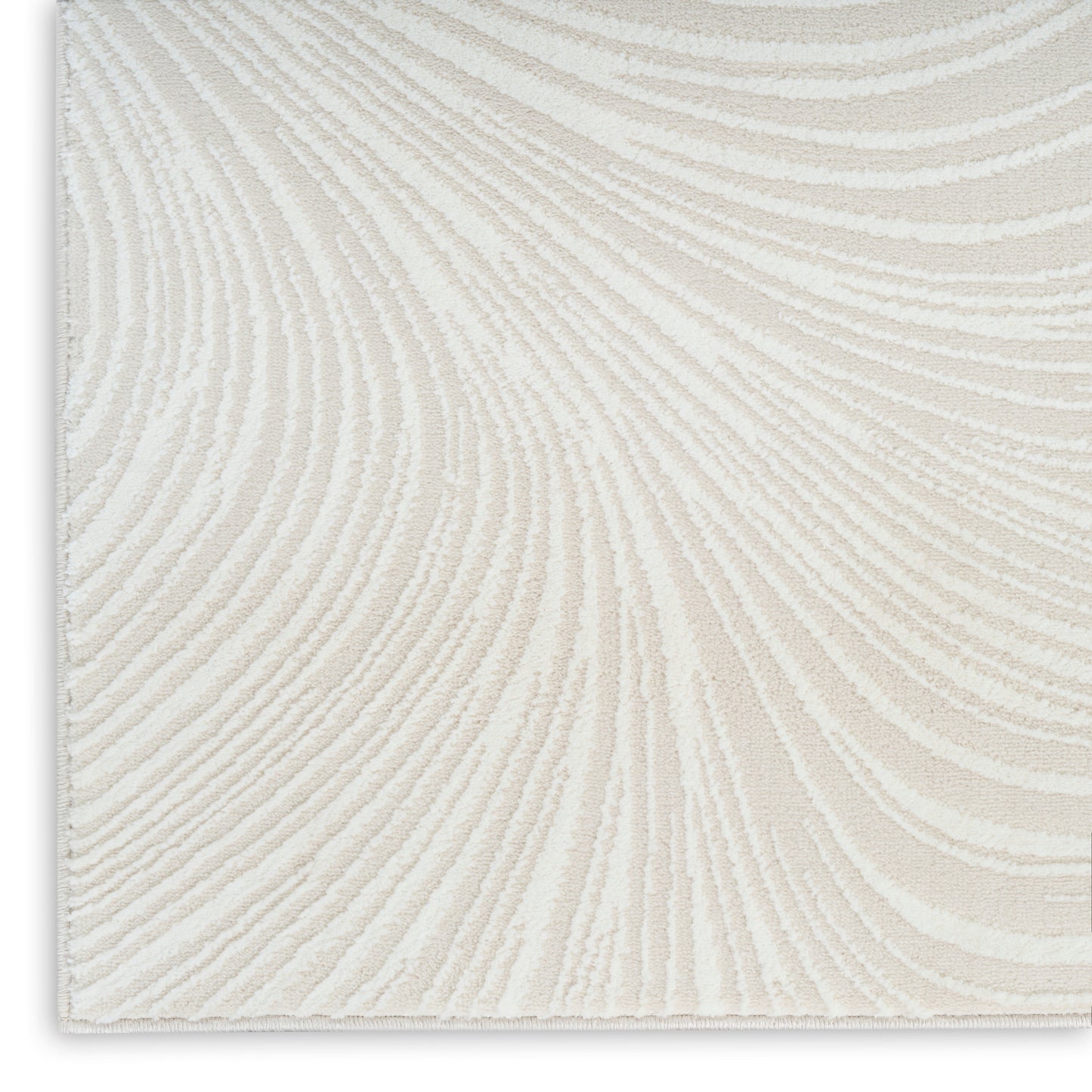 Cream textured runner rug with beige curved stripe pattern and soft looped pile, 8' long.
