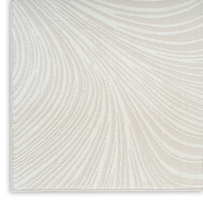 Cream textured runner rug with beige curved stripe pattern and soft looped pile, 8' long.