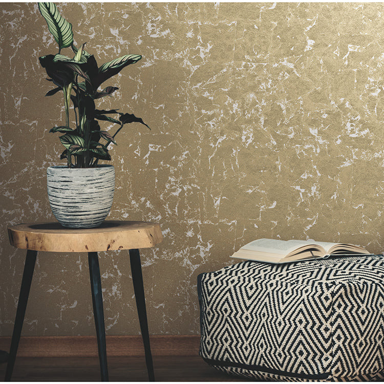 gold-metallic leaf peel-and-stick wallpaper showing subtle botanical leaf pattern and shimmering texture — perfect for glam accent walls and easy DIY decorating.