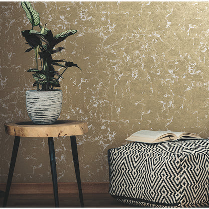 gold-metallic leaf peel-and-stick wallpaper showing subtle botanical leaf pattern and shimmering texture — perfect for glam accent walls and easy DIY decorating.
