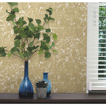gold-metallic leaf peel-and-stick wallpaper showing subtle botanical leaf pattern and shimmering texture — perfect for glam accent walls and easy DIY decorating.