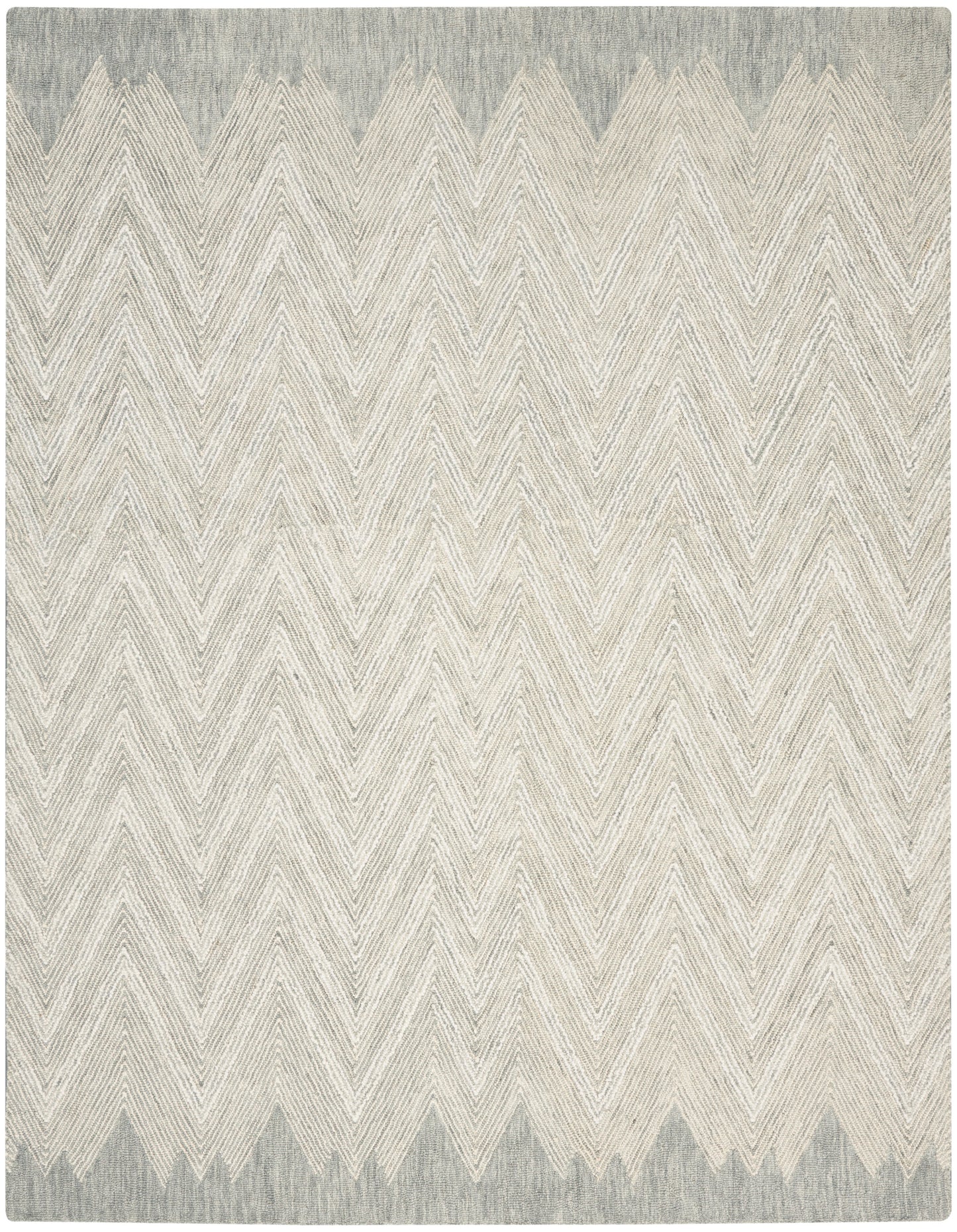 Woven area rug in cream and gray chevron pattern with a muted gray border for modern neutral decor.