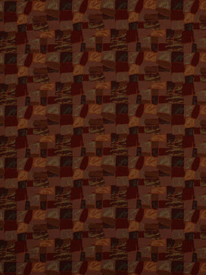 Dark brown and burgundy patchwork fabric with small square tiles; warm earthy textile for upholstery or fashion.