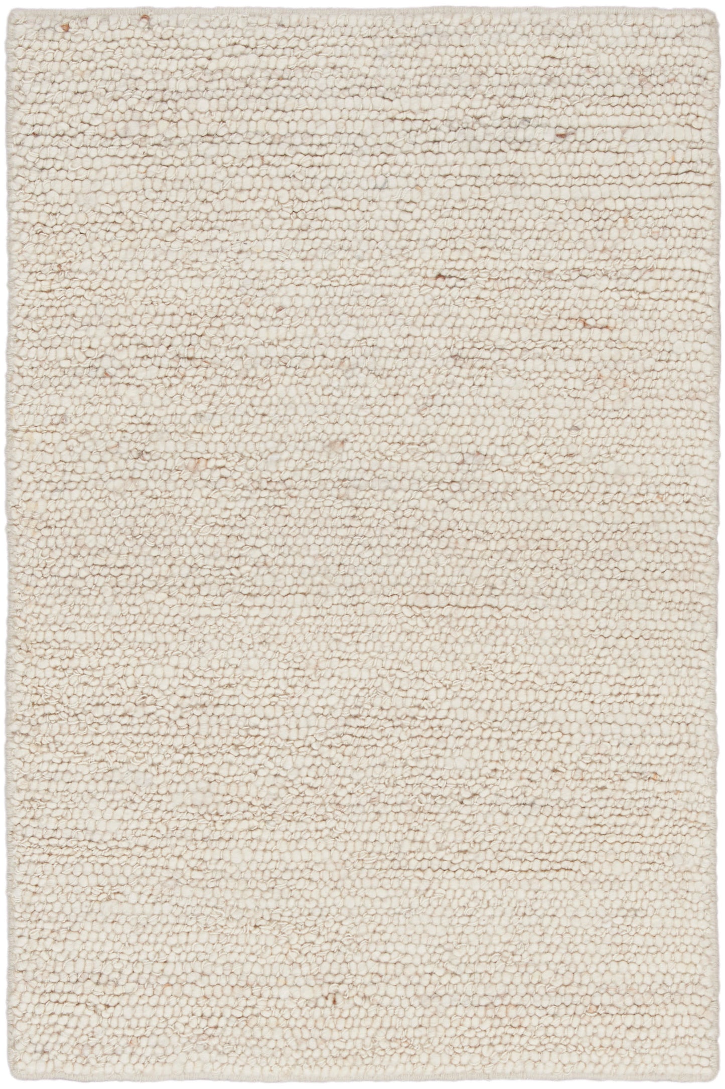 Cream boucle shag rug with chunky, textured pile; rectangular, soft neutral beige.