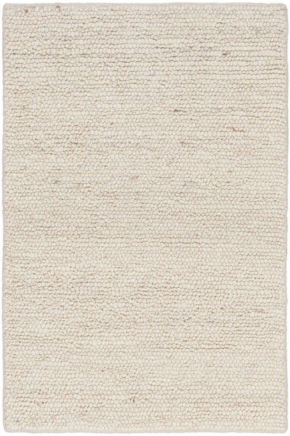 Cream boucle shag rug with chunky, textured pile; rectangular, soft neutral beige.