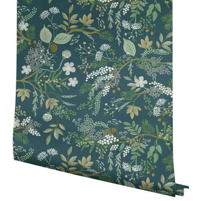 Juniper Forest Wallpaper in Pine by Rifle Paper Co. featuring detailed woodland branches, pinecones, berries, moss, and forest greenery in rich green tones. Luxury botanical wallpaper ideal for accent walls, living rooms, bedrooms, cabins, dining rooms, offices, cottagecore interiors, rustic décor, woodland nurseries, vintage-inspired homes, and nature-themed interior design projects. Premium non-woven wallcovering with layered forest patterns and timeless organic style.
