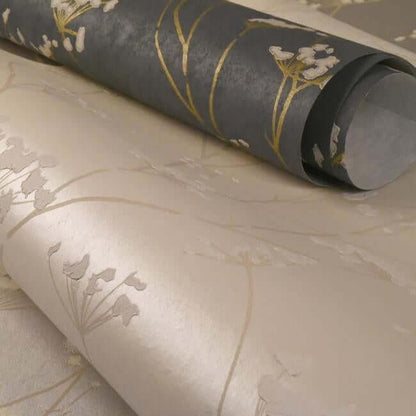 Enchanted Wallpaper in Anchor Grey featuring delicate long-stemmed wildflowers on a textured handmade paper-inspired background. This elegant botanical wallpaper adds soft floral charm and natural beauty to bedrooms, living rooms, dining rooms, accent walls, and cottagecore-inspired interiors.
