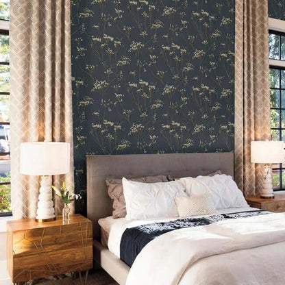 Enchanted Wallpaper in Anchor Grey featuring delicate wildflowers with long stems scattered across a textured handmade paper-inspired background. This botanical floral wallpaper brings soft natural elegance to bedrooms, living rooms, dining rooms, powder rooms, and cottagecore, farmhouse, and traditional interiors.
