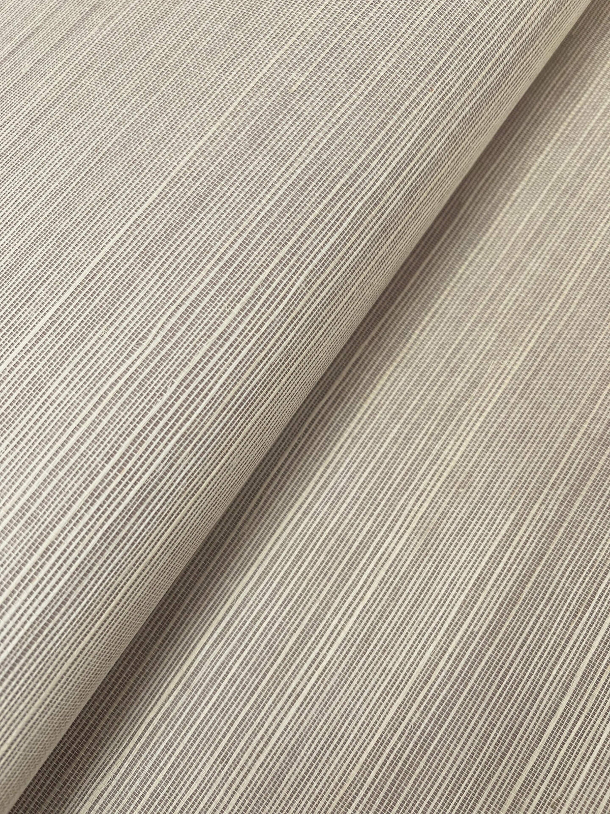 Magnolia Home Plain Grass Wallpaper in Pale Gray, VG4406MH, featuring natural cream-white sisal fibers woven into a textured grasscloth design. This elegant neutral wallpaper adds organic texture and depth to bedrooms, living rooms, dining rooms, offices, and accent walls. Ideal for modern, coastal, transitional, and natural interiors