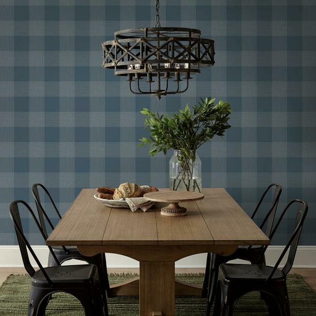 Navy and white wallpaper with a subtle thread-like pattern.