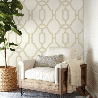 Woven Trellis wallpaper by Magnolia Home featuring oversized geometric trellis patterns in soft beige tones with a structured modern design. A removable SureStrip™ wallpaper ideal for accent walls, bedrooms, living rooms, dining rooms, and farmhouse or transitional interior design styles.