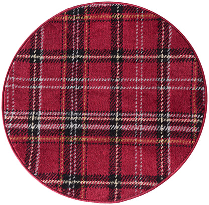 Round red plaid rug with black, white, and yellow checks; tartan-style.