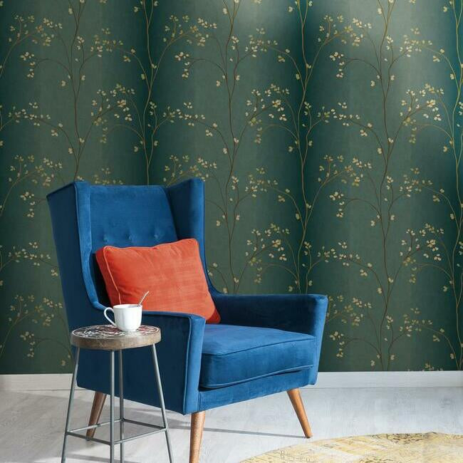 York Wallcoverings Earthy Tones Vertical Blossoms Teal Metallic Wallpaper (BR6224) displayed on a  living room accent wall — vertical blossoms in teal and metallic tones, textured botanical wallcovering, elegant floral design, metallic sheen wallpaper for luxe interior, ideal for accent walls in bedrooms or dining rooms.