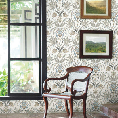 York Wallcoverings “Seaside Jacobean” wallpaper (MN1915) in taupe and blue, featuring elegant Jacobean floral vines inspired by Mediterranean wildflowers on an easy-to-install prepasted Sure Strip material.
