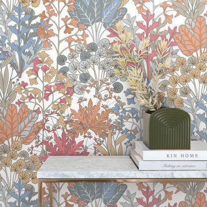 Large‑scale botanical wallpaper in coral and blue on white by York Wallcoverings, pattern BL1813 Forest Floor, non‑woven, washable and strippable.
