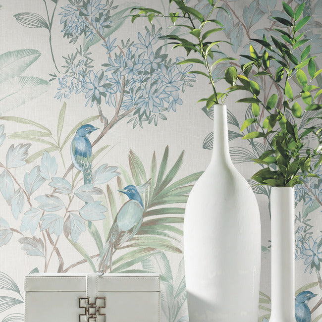 York Wallcoverings Handpainted Songbird peel and stick wallpaper featuring colorful birds perched on branches with blossoms, accented with turquoise on a soft canvas-inspired background. Removable floral and bird wallpaper ideal for living room accent walls, bedrooms, offices, and nature-inspired home décor.