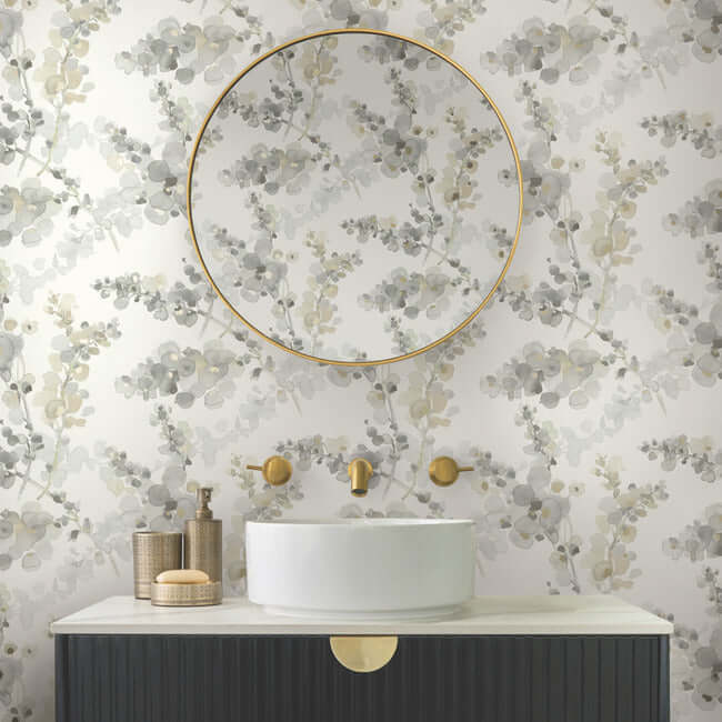 Candice Olson Blossom Fling Wallpaper in Steel with loose, painterly floral branches, soft gray blossoms, warm neutral flower centers, and delicate stems against a light background. Perfect for refined bedroom, dining room, and living room decor.