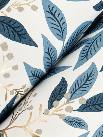 Lush vine and metallic berry floral wallpaper in blue by Rifle Paper Co, pattern RF7461 from the Third Edition, non-woven washable wallcovering.