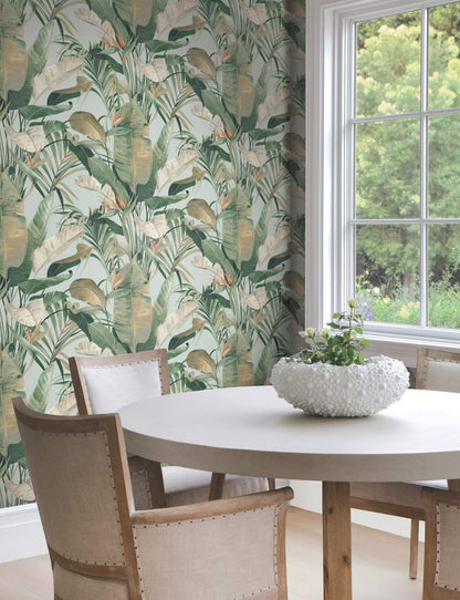 Candice Olson Tropical Cabana wallpaper spa color by York Wallcoverings, tropical banana leaf wallpaper with gazebo pattern in green, rust, and mustard on pastel blue background, luxury resort style wallcovering for coastal living room, bedroom, or accent wall interior design