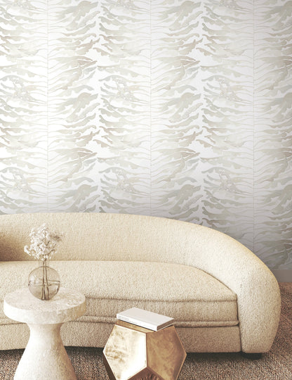 Leaf Column neutral botanical wallpaper with pale grey watercolor fronds forming an organic vertical stripe pattern with subtle silver accents, modern nature inspired wallcovering for living rooms, bedrooms, accent walls, contemporary and organic modern interior design.