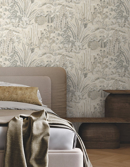 Designer Lotus Land Cacti wallpaper with organic desert plant pattern in earthy neutral tones, non‑woven washable wallcovering ideal for accent wall, living room, bedroom, dining room and modern eclectic interiors.